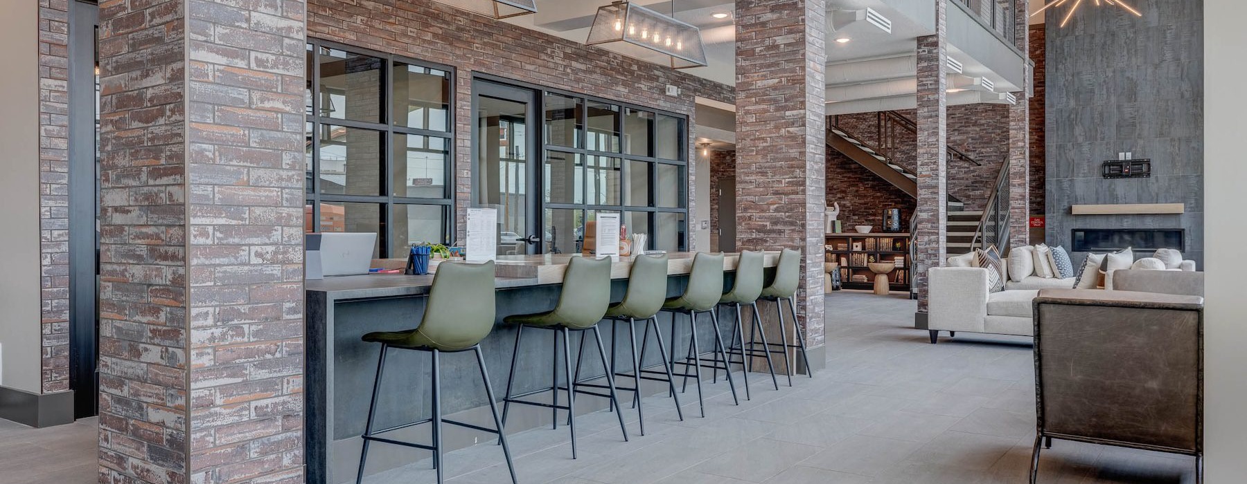 a clubroom with tables and chairs