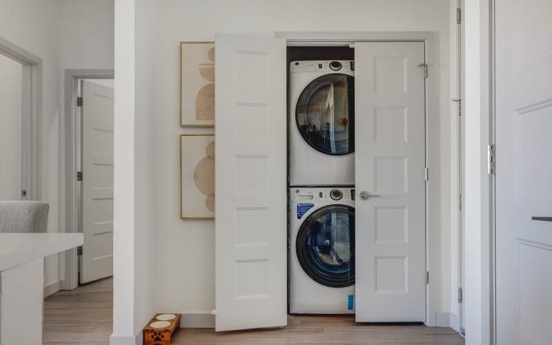 a washer and dryer in a closet