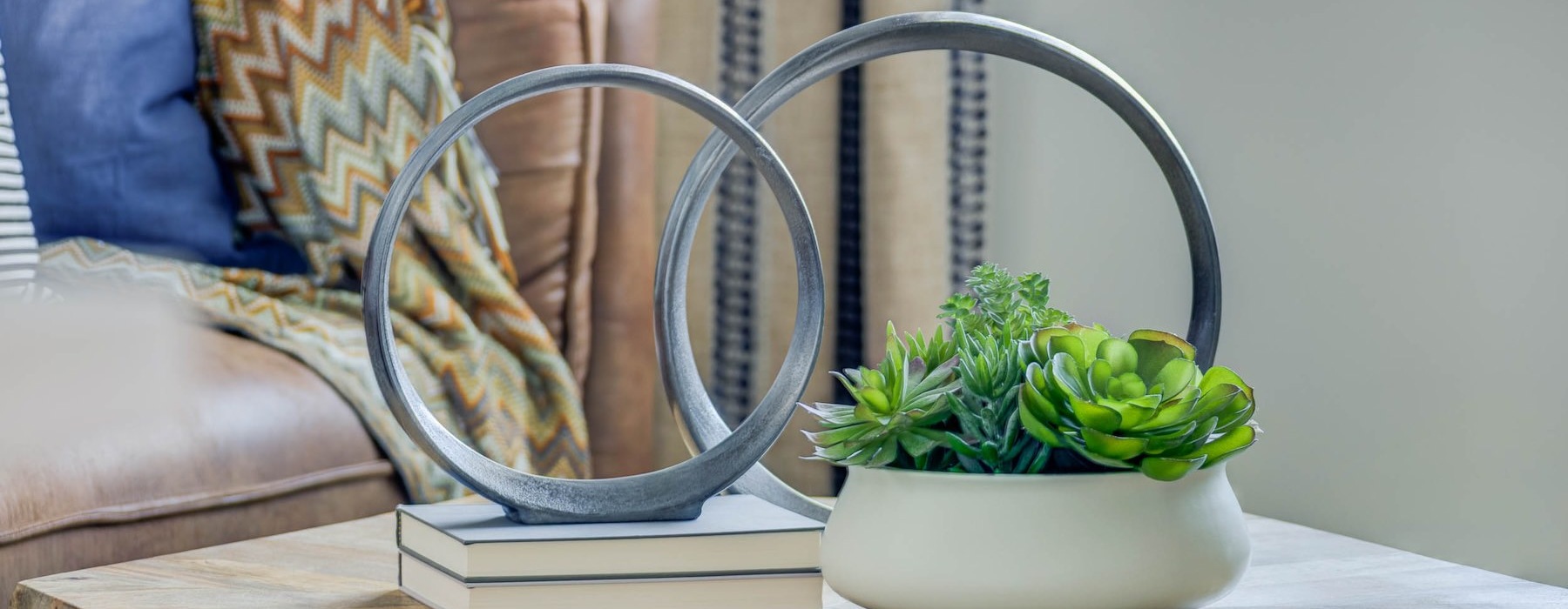 a chair and a potted plant on a table