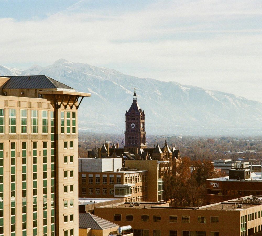 Salt Lake City downtown skyline with the mountains behind it.